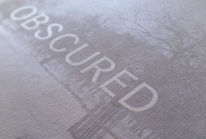 Printing white ink on to coloured material